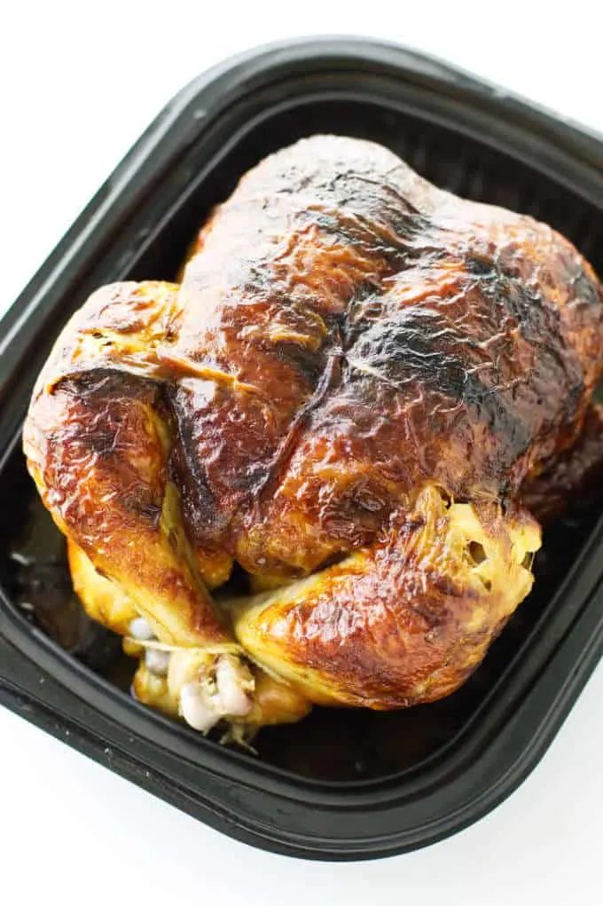A rotisserie chicken ready to be used in chicken soup with wild rice.