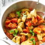 A serving dish with chicken Karahi.