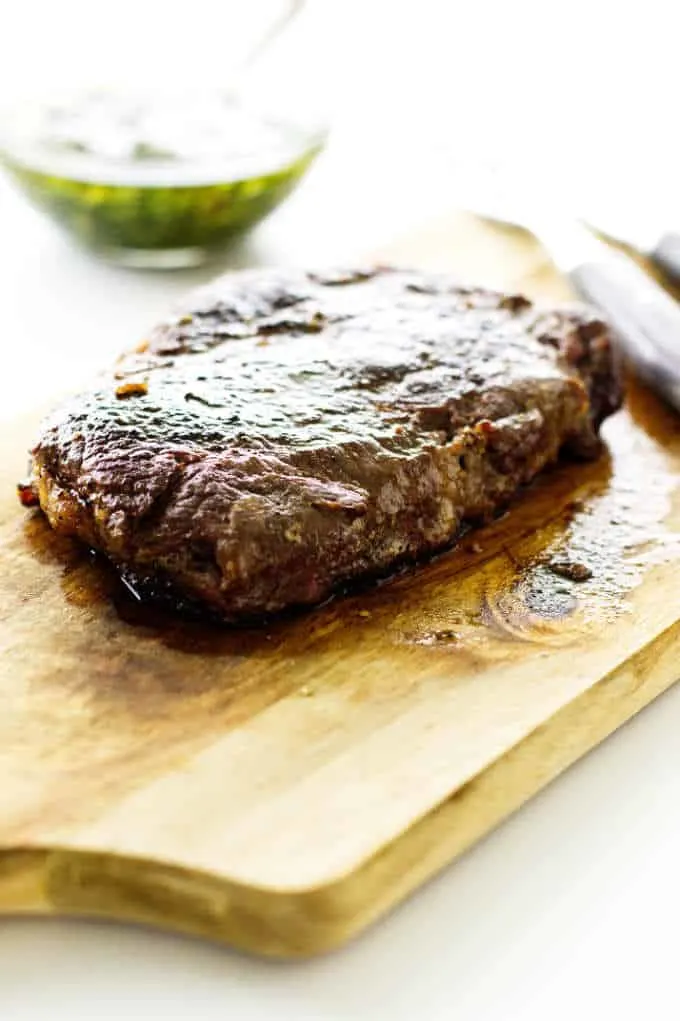 ribeye steak on cutting board