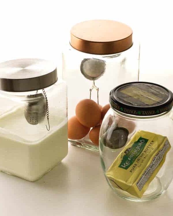 3 jars showing the process to infuse truffle flavor into food.