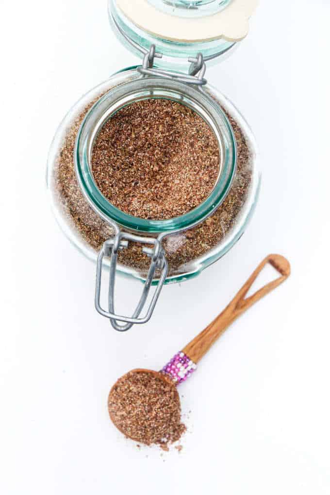 Homemade Mexican seasoning blend in a large jar. 