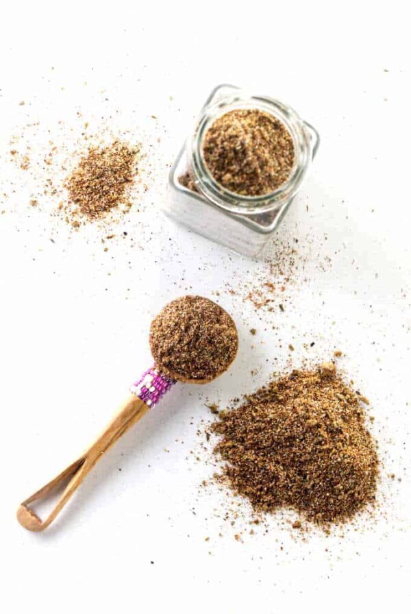 Homemade taco seasoning in a spice jar.