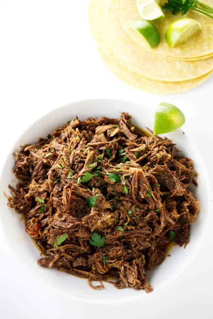 Shredded beef and some corn tortillas.