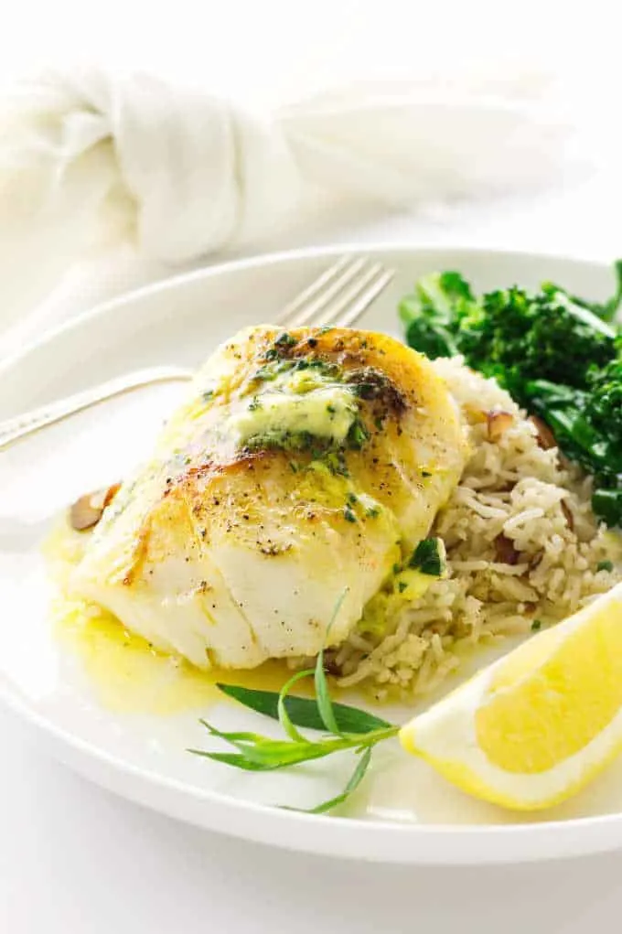 Pacific Cod with Lemon Tarragon butter melting on Basmati Rice Pilaf