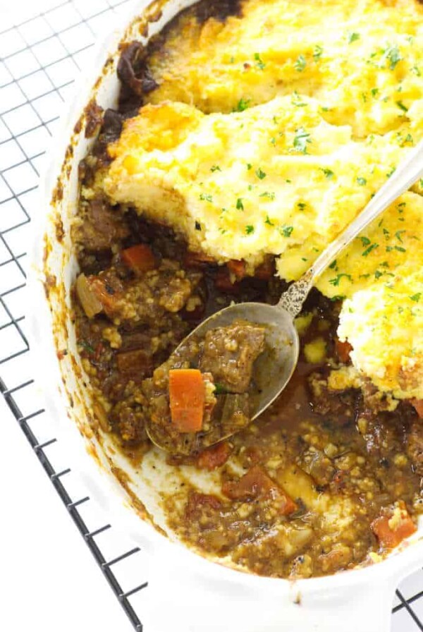 Overhead view of ossobuco casserole and serving spoon