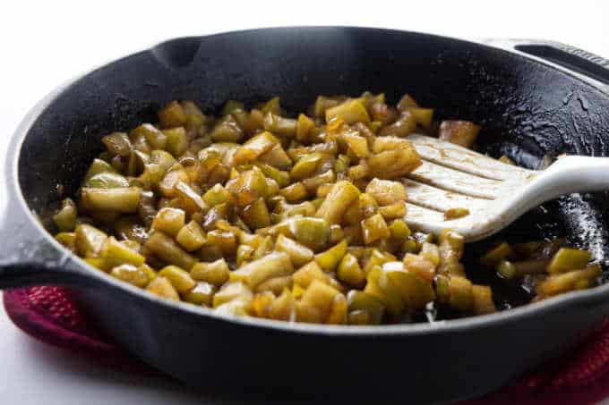 A skillet of sautéed cinnamon apples.