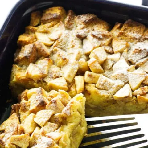 Serving of French Toast casserole being lifted from baking dish