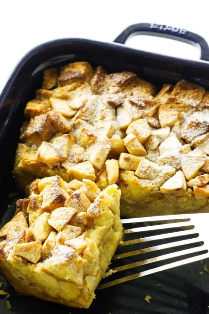 Serving of French Toast casserole being lifted from baking dish