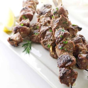 overhead view plate of lamb kabobs