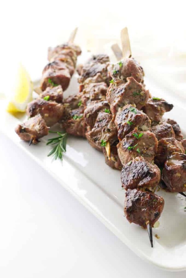 overhead view plate of lamb kabobs