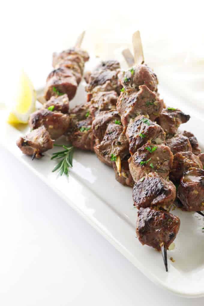 overhead view plate of lamb kabobs