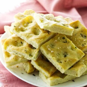 Plate of focaccia bread and pink napkin