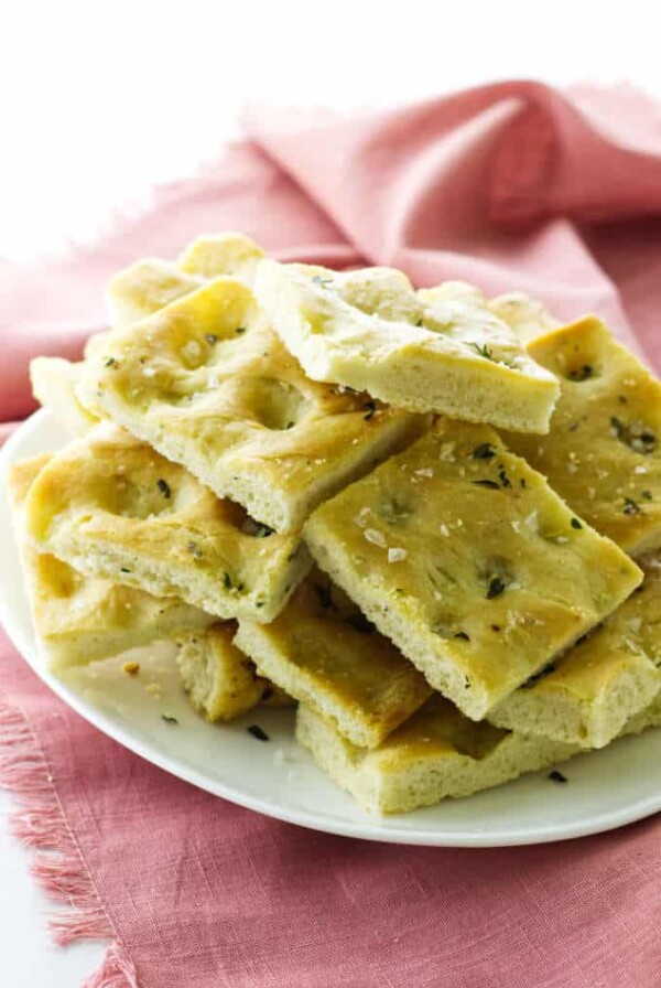 Plate of focaccia bread and pink napkin