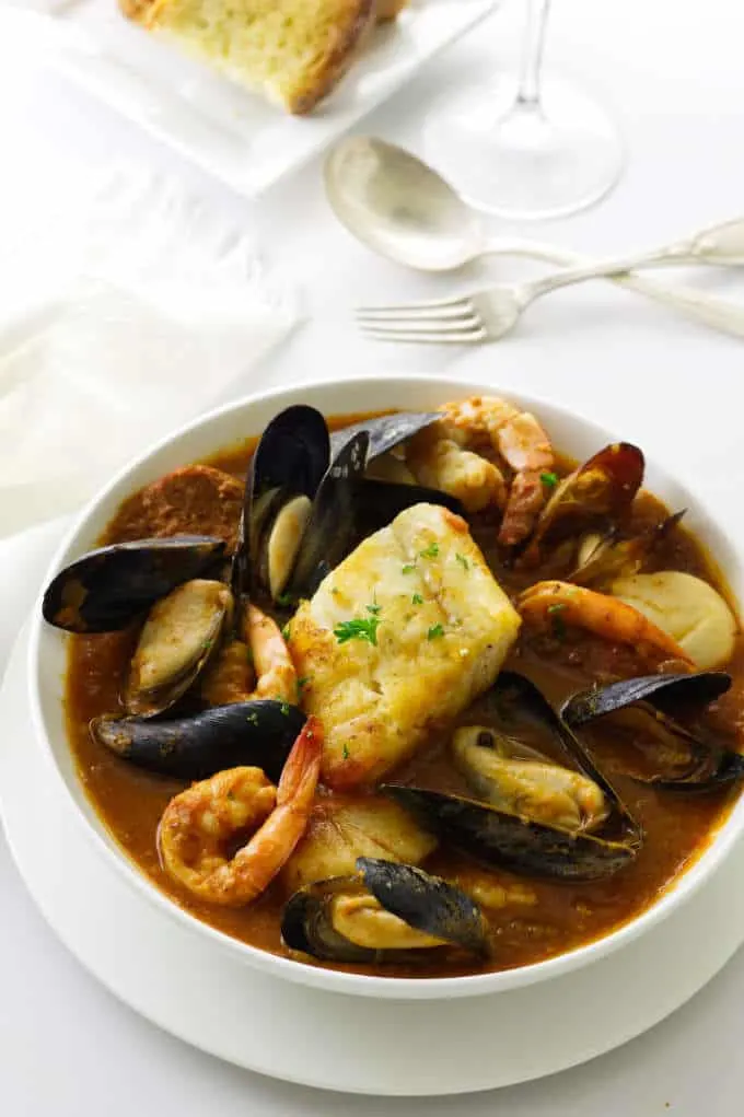Seafood stew of mussels, scallops, shrimp, chorizo sausage and Pacific cod in a spicy sauce