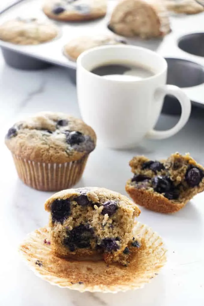 Blueberry muffins with a cup of coffee.