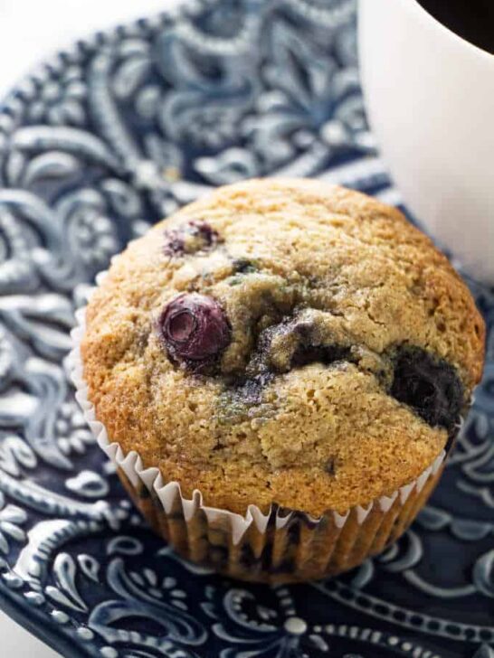 Close up of a spelt blueberry muffin.