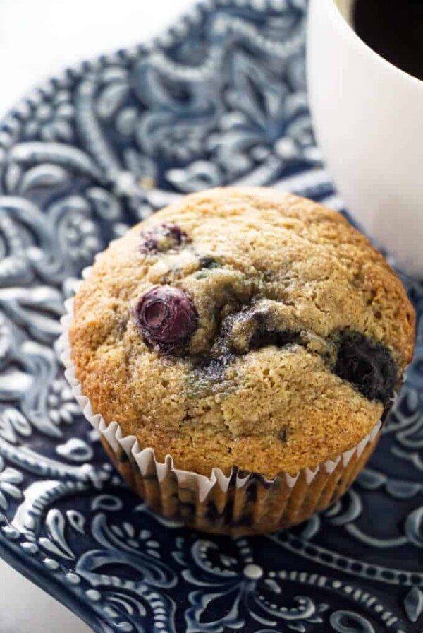 Close up of a spelt blueberry muffin.