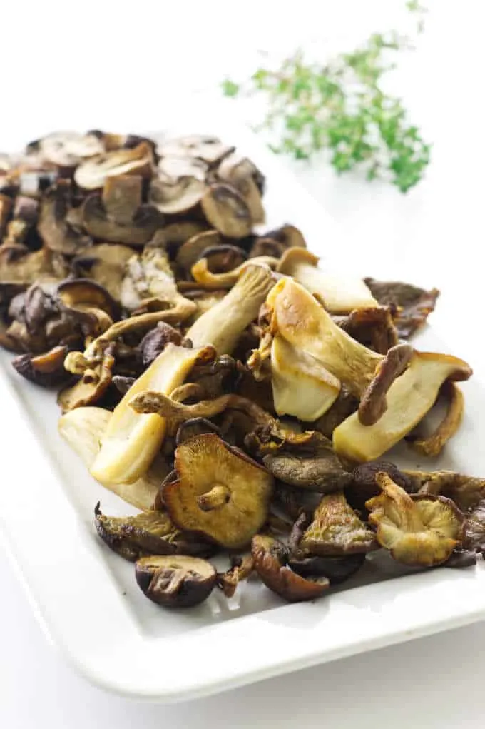 plate of a variety of roasted wild mushrooms