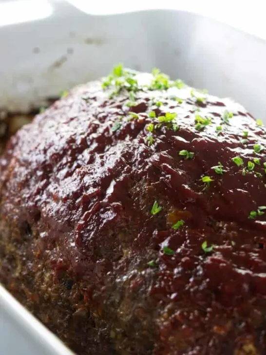 A loaf of meatloaf with a sweet glaze on top.