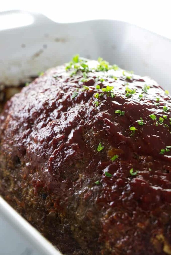 A loaf of meatloaf with a sweet glaze on top.