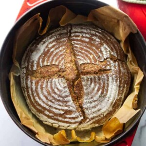 Sourdough spelt bread fresh out of the oven and still in a Dutch Oven.