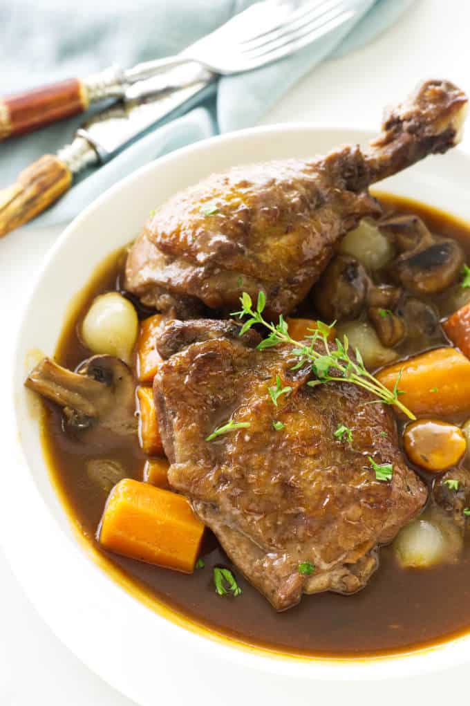 Overhead view of a serving of coq au vin