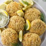 Overhead photo of six Dungeness crab cakes.