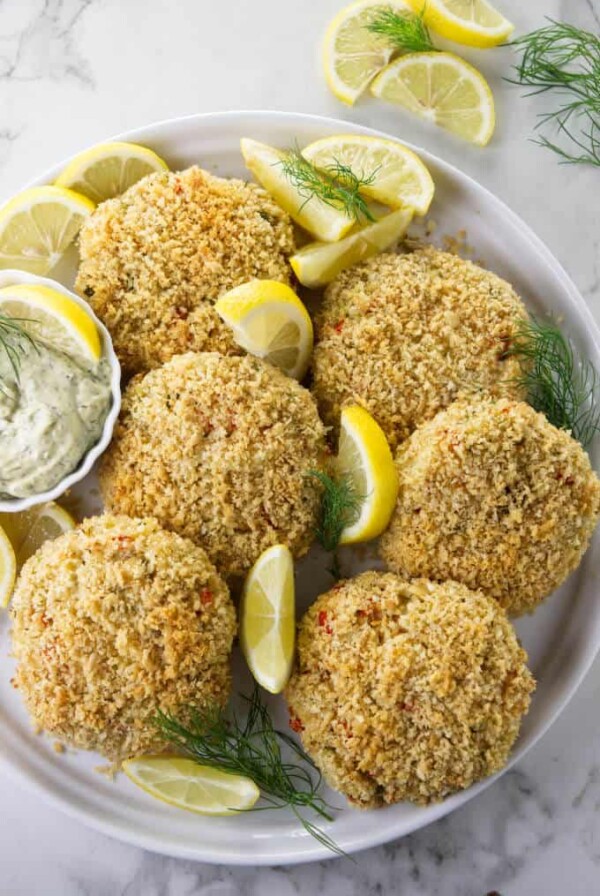 Overhead photo of six Dungeness crab cakes.