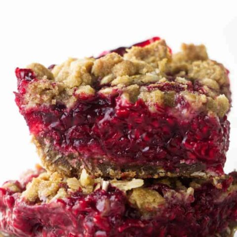 Two fresh raspberry bars stacked on each other.