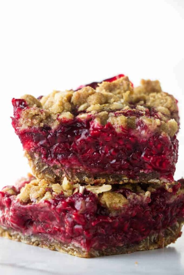 Two fresh raspberry bars stacked on each other.