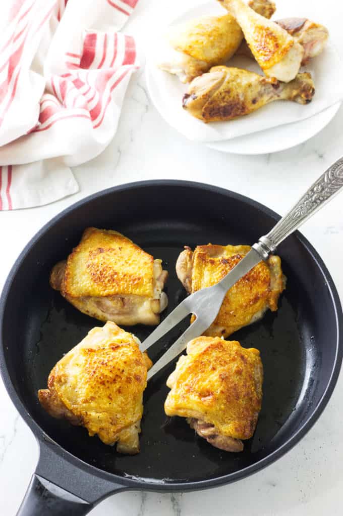 Browning chicken for slow cooker Coq au Vin.