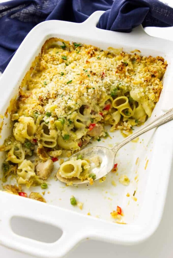 Overhead view of a dis of tuna pasta casserole with a spoon