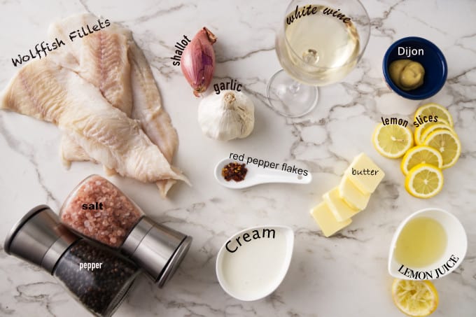 ingredients needed for wolffish recipe with white wine butter sauce.