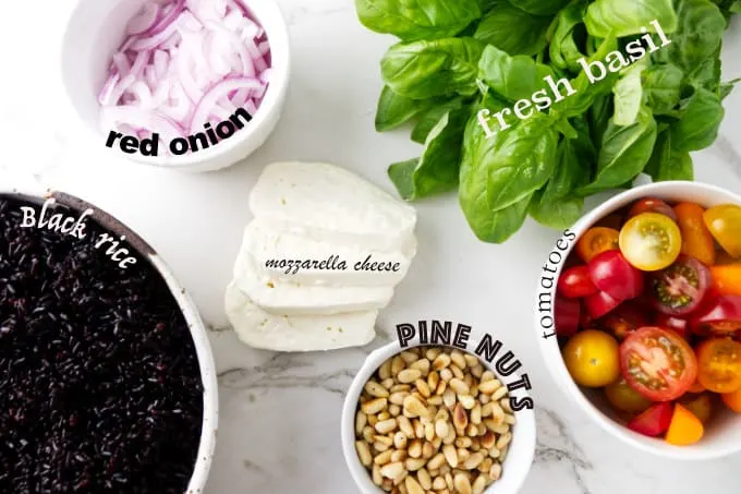 Ingredients needed for black rice salad with tomatoes and basil