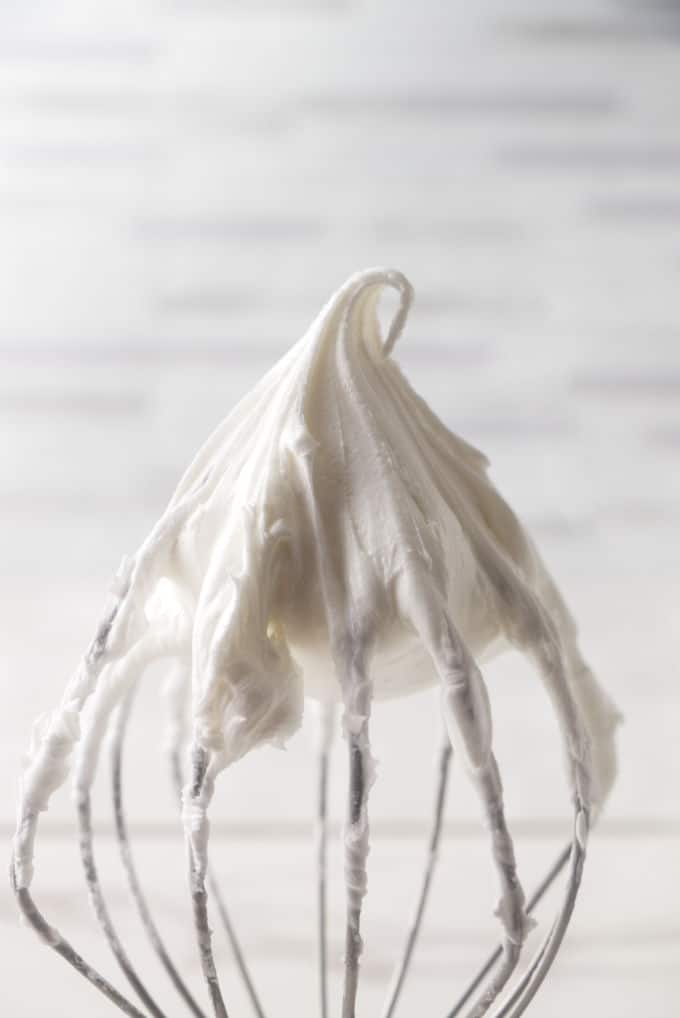 White icing on a whisk.
