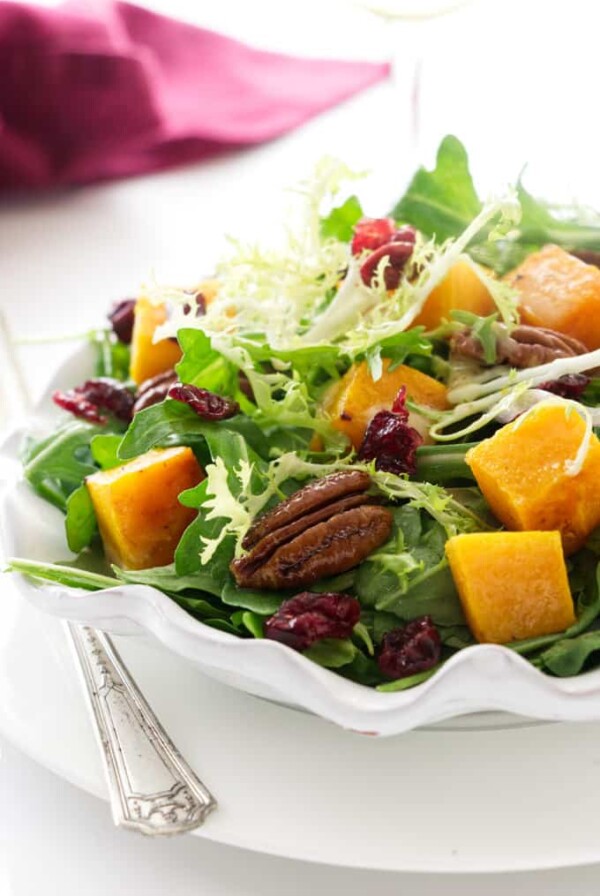 A serving plate with butternut squash salad.