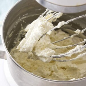 Fluffy frosting on mixer whisk