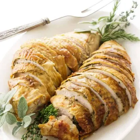 https://savorthebest.com/wp-content/uploads/2020/11/roasted-turkey-breast-with-garlic-herb-butter-sliced-on-a-platter_2268-480x480.jpg.webp