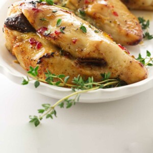 Close up view of a platter of fig and brie stuffed chicken breasts