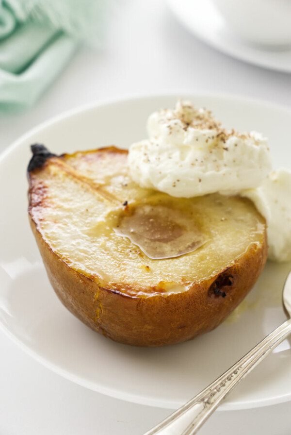 close up photo of a serving of roasted pear with mascarpone cream