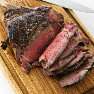 Overhead view of Reverse sear cowboy steak on cutting board