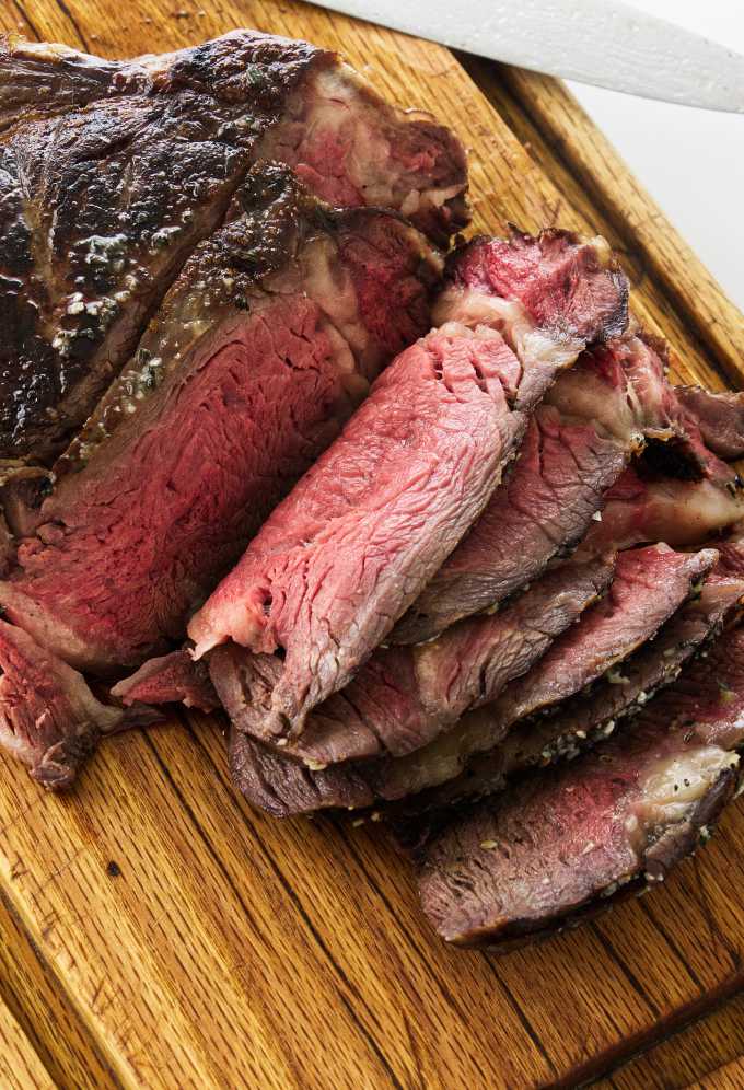 Close up view of cowboy steak on cutting board