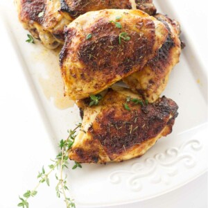 Oven roasted chicken thighs on a plate