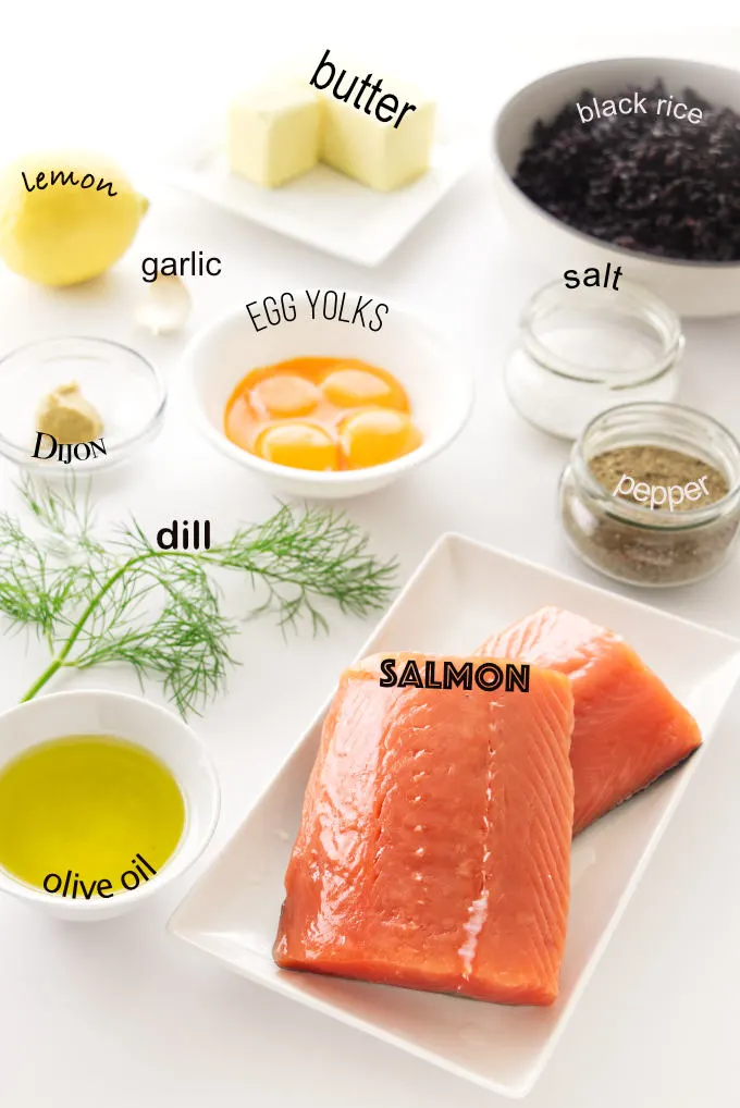 Ingredients for pan-seared salmon with dill hollandaise sauce, including a bowl of black rice