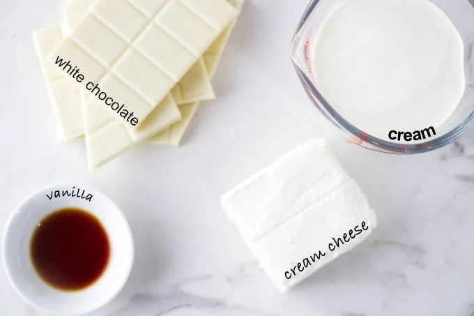 Ingredients needed to make white chocolate mousse for cake.