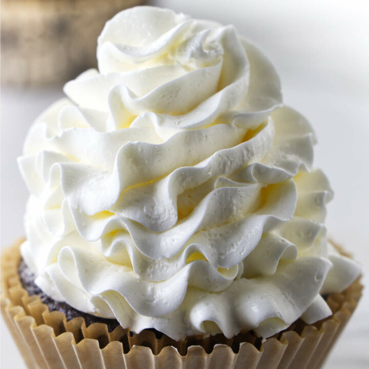 Italian meringue buttercream on a chocolate cupcake.