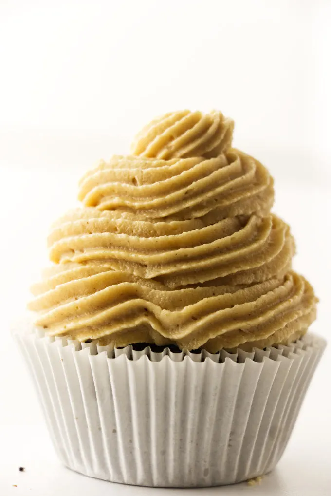Peanut butter cream cheese frosting on a cupcake.
