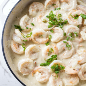 Creamy Chinese coconut shrimp in a skillet.