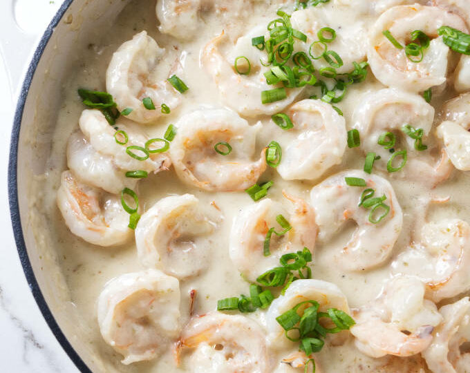 Creamy Chinese coconut shrimp in a skillet.