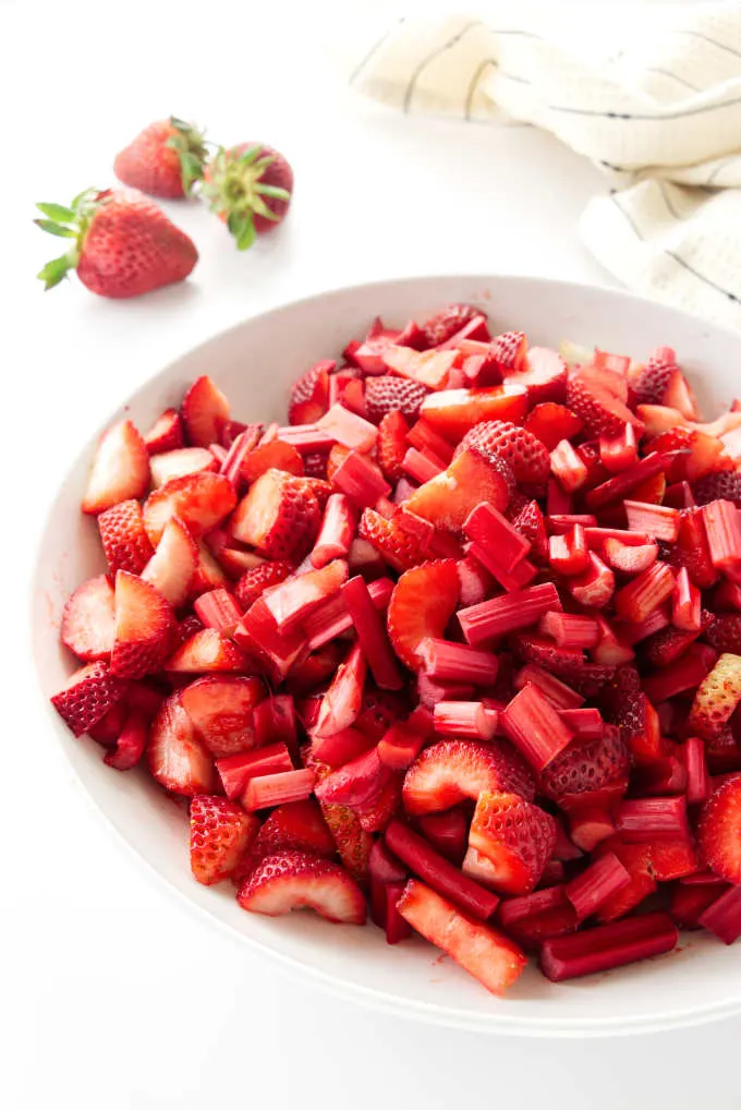 Sliced strawberries and Rhubarb in a bowl